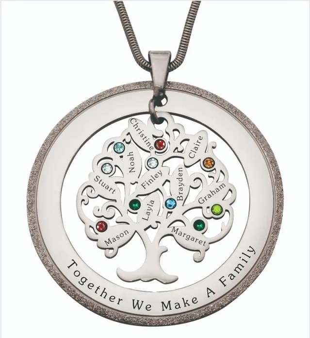 Silver necklace of a family tree with names on.